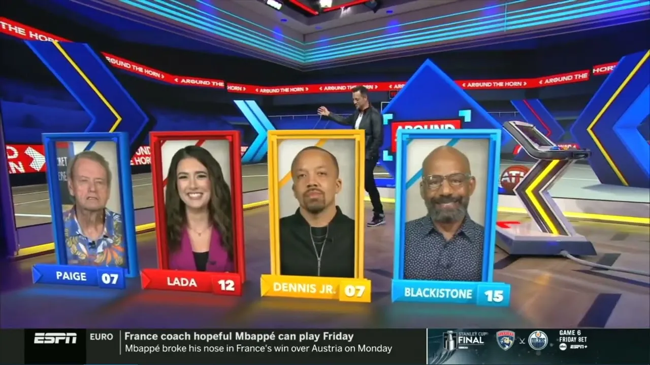 Around the Horn set with Tony Reali and the panelist scoring system visible